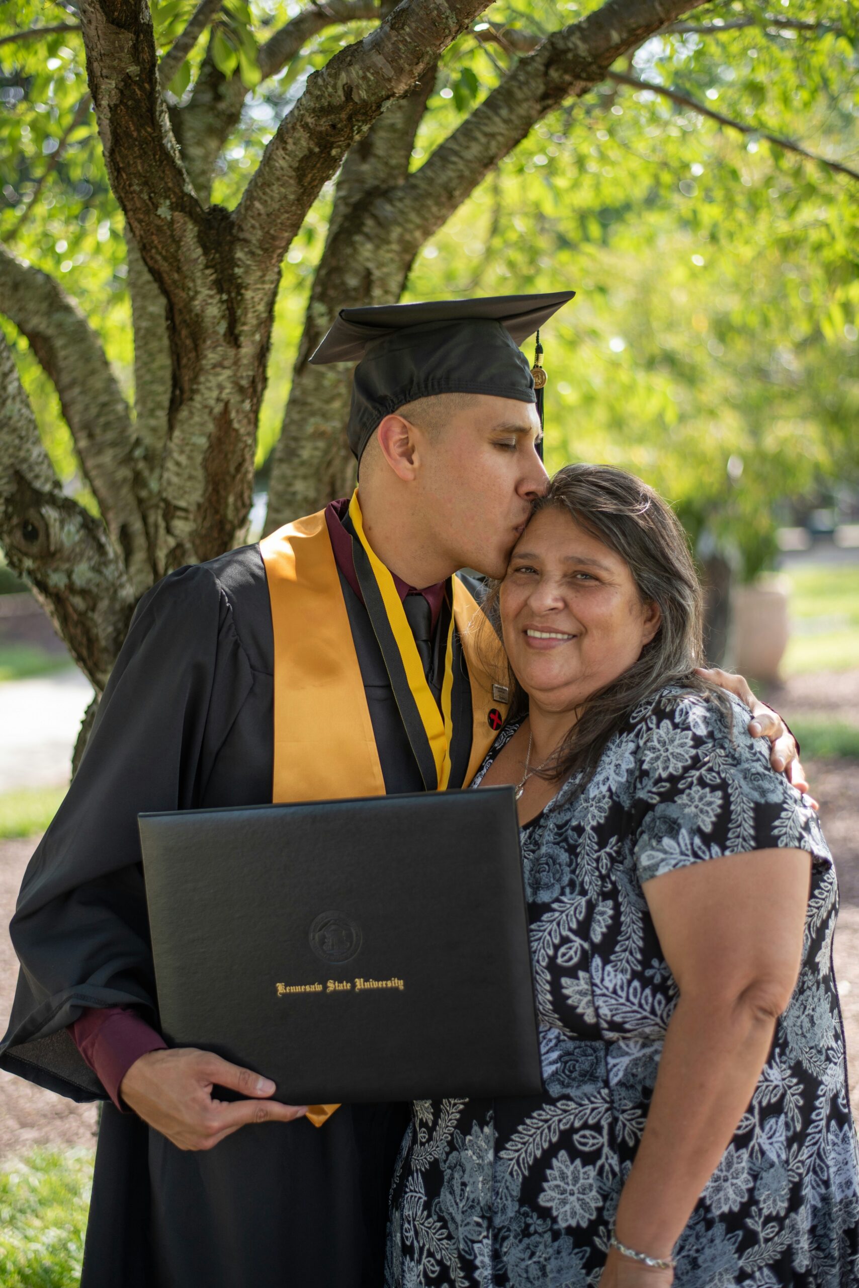 man wearing black graduation